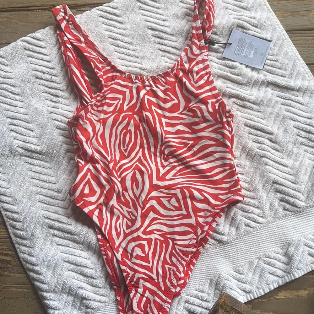 NWT FP x ITS NOW COOL the showtime one piece in fuego Zebra red white size small